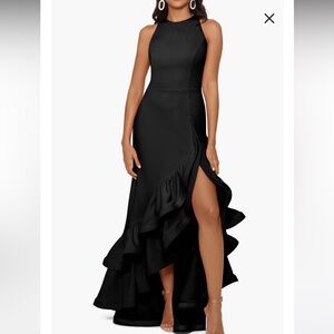 Like new stunning black dress. Long with dramatic ruffles and high neck line